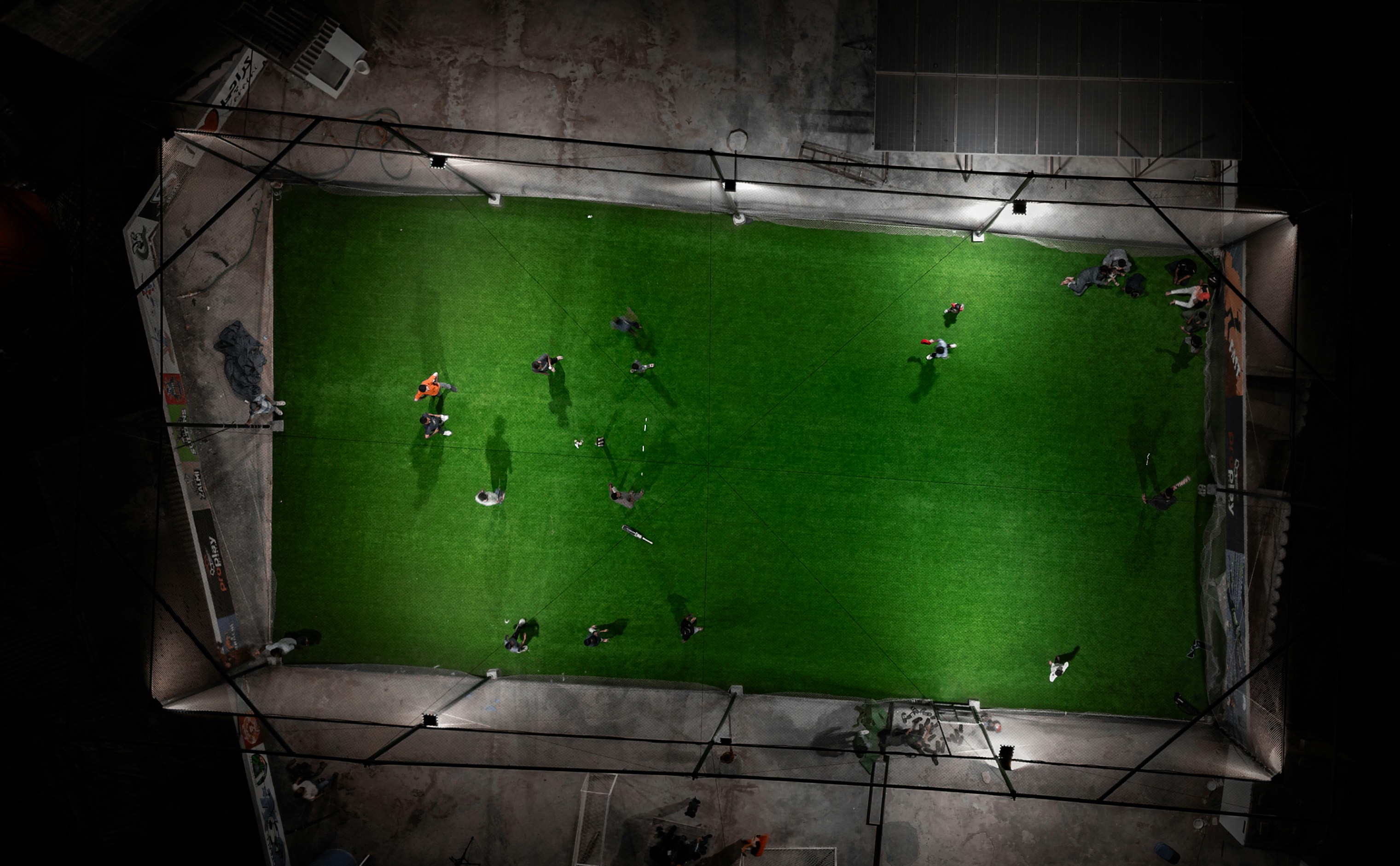 Football players in action on a pitch